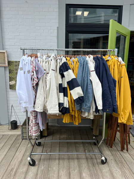 Wide striped raincoat with sealed seam